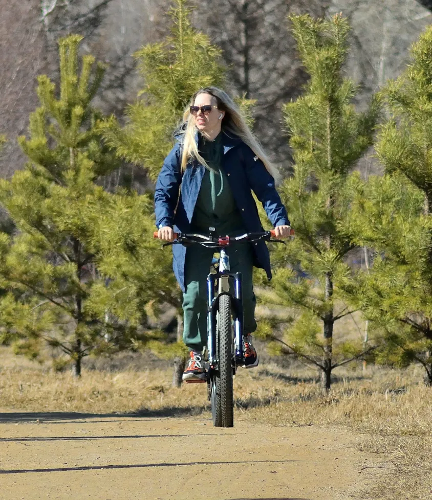Woman Cycling Bike Time